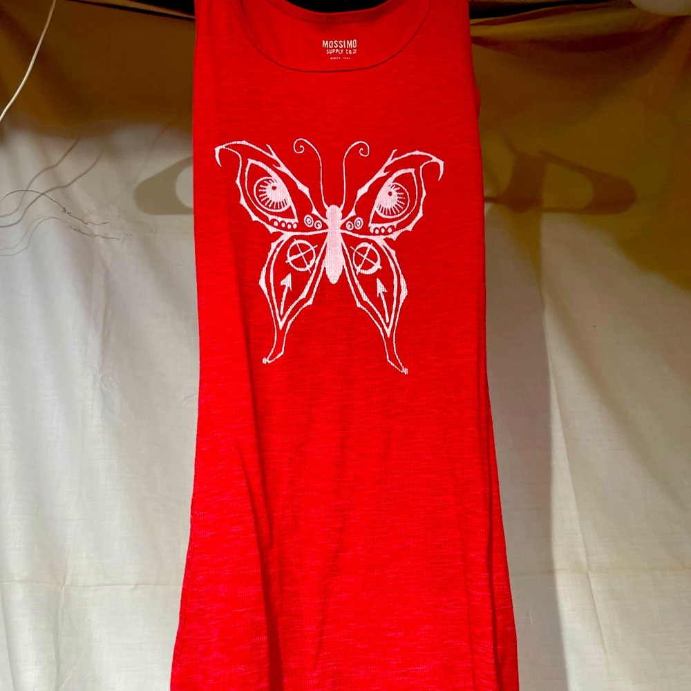 White “Evil Eye Butterfly” on red tank top.  Original art one off
